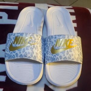 Leopard print Nike slides. Never worn. Size womans 8